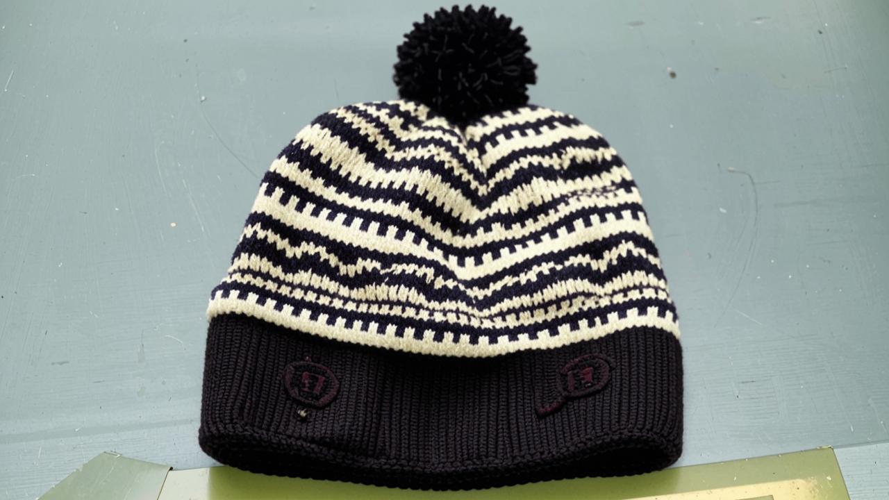 Woolen hat with pompom for men by Finn Flare, 1049 rubles. 