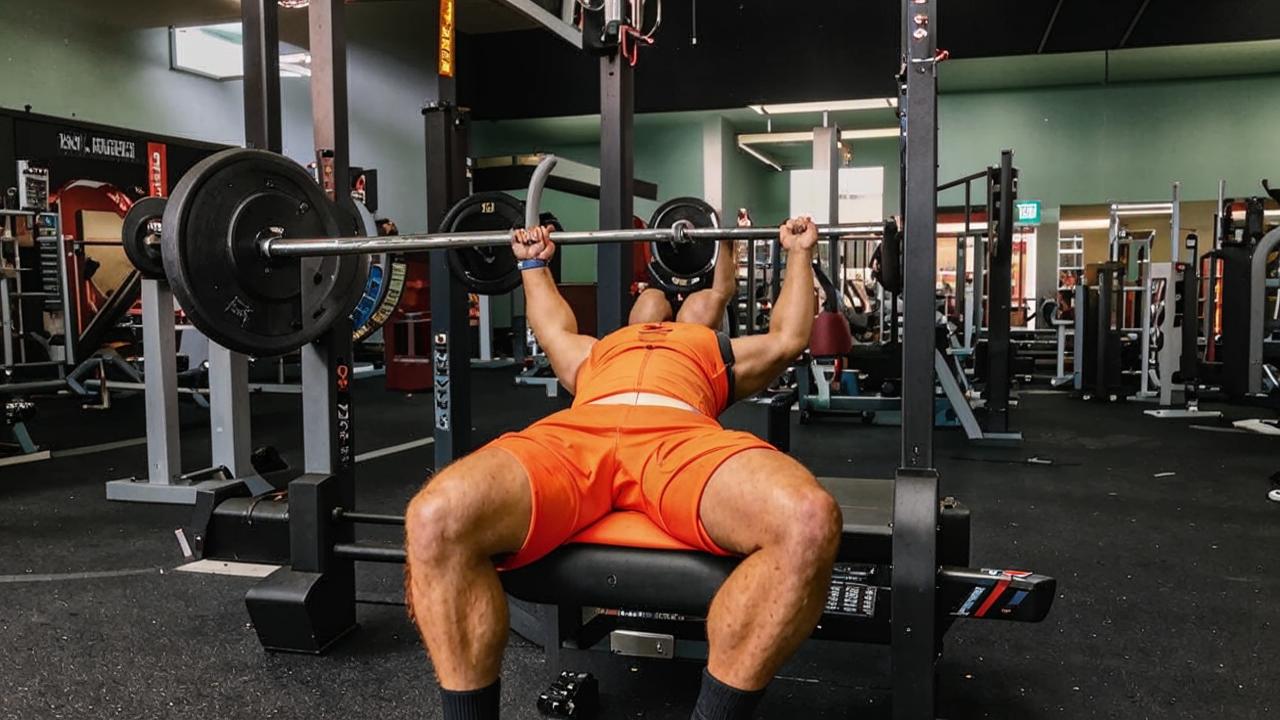 What is the correct way to do the narrow grip bench press?